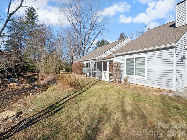 a house with trees in front of it