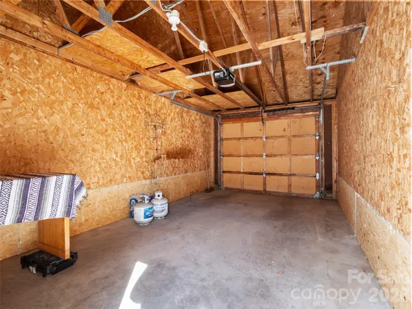 a view of a room with wooden walls