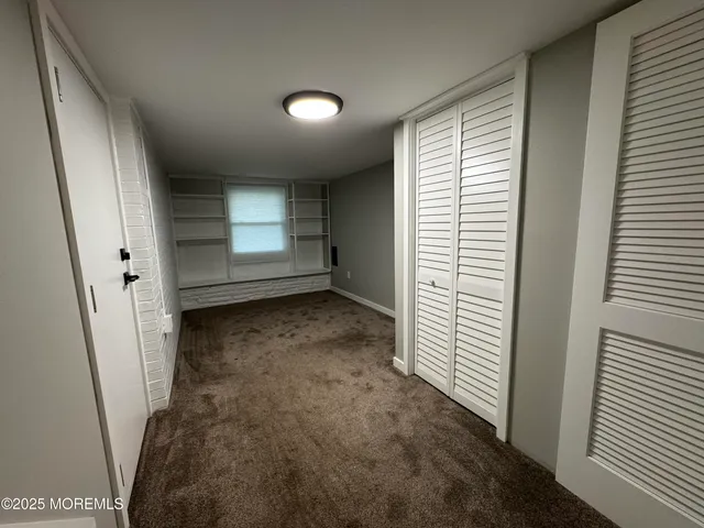a view of a livingroom with a staircase