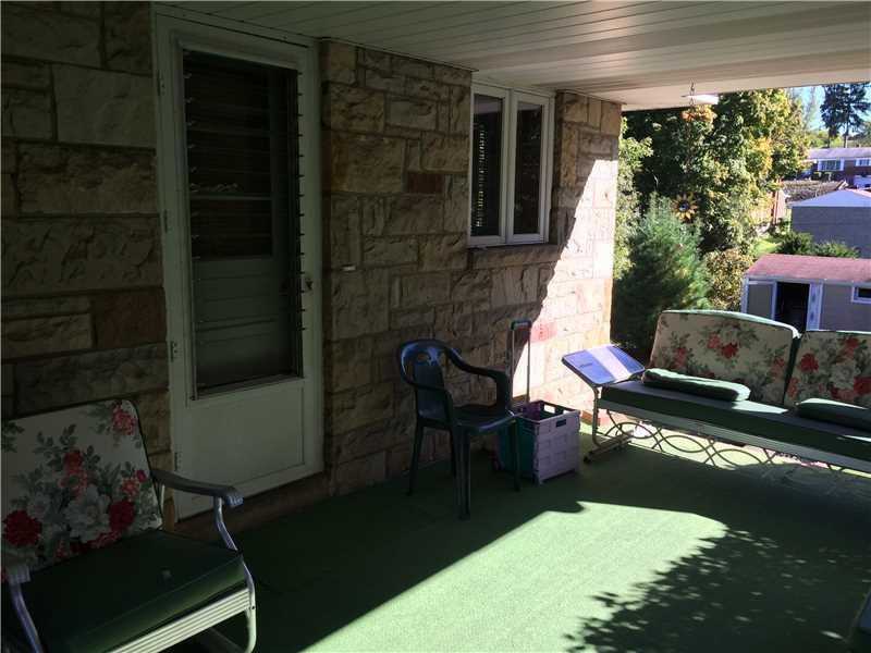 18 East Ridge Road Coraopolis, PA 15108 - Photo 11 of 24 Patio/Deck. Relax on theis Side porch with a Breeze and Peace and Quiet