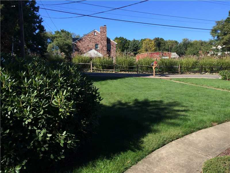 18 East Ridge Road Coraopolis, PA 15108 - Photo 17 of 24 Yard/Garden. This is View from Side Porch to the Front Yard