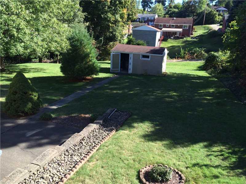 18 East Ridge Road Coraopolis, PA 15108 - Photo 19 of 24 Yard/Garden. Large yard for entertaining, and Concrete Block Shed for storage