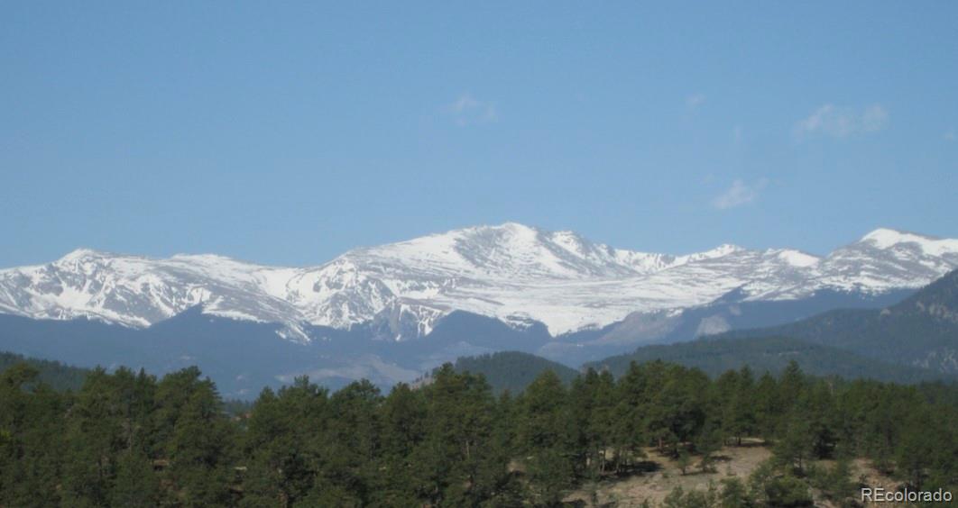 2859 Highlands View Road Evergreen, CO 80439 - Photo 1 of 22 a view of a snow in the middle of a mountain