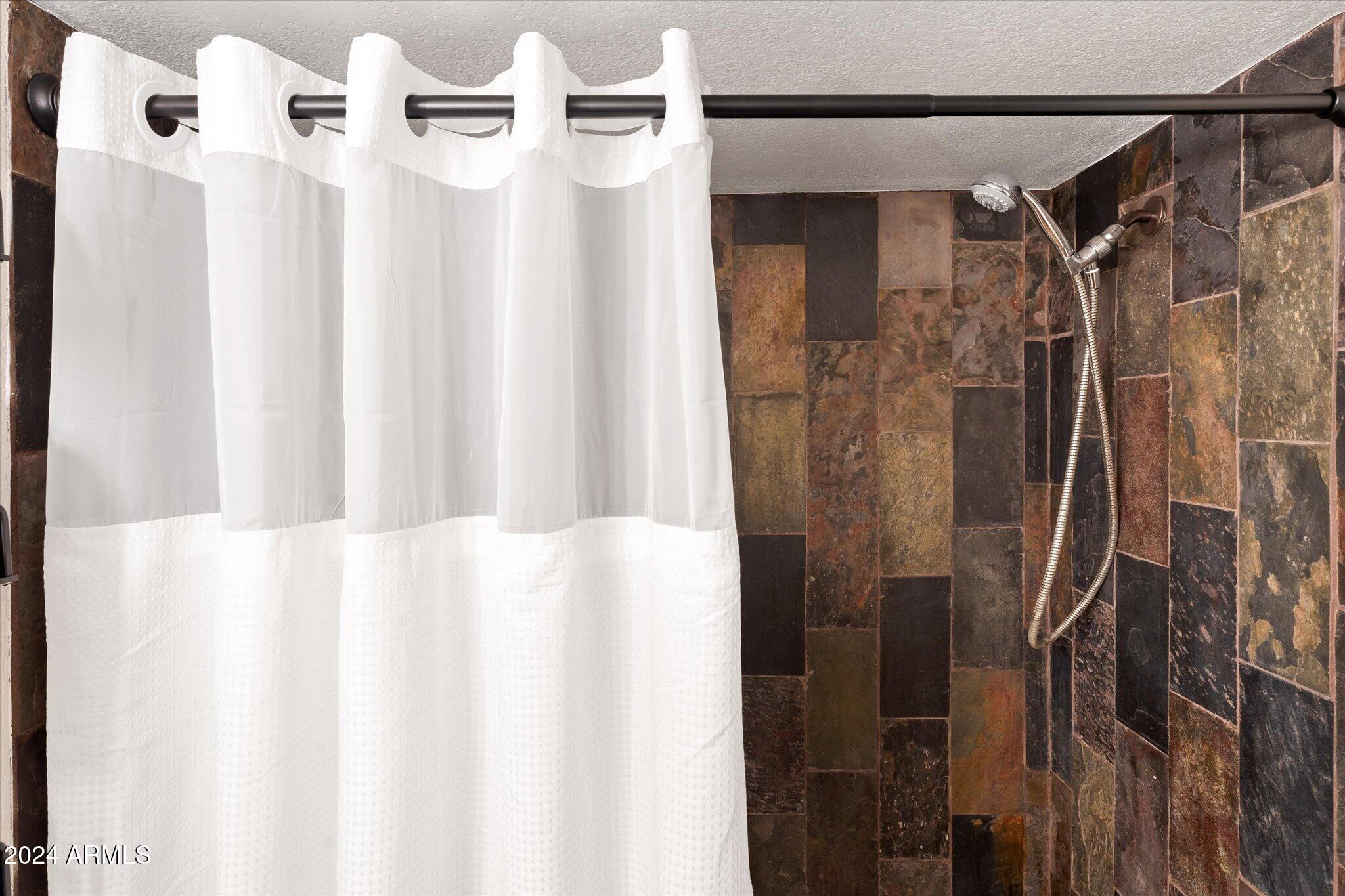 533 West Guadalupe Road, Unit 1063 Mesa, AZ 85210 - Photo 24 of 57 a bathroom with a shower