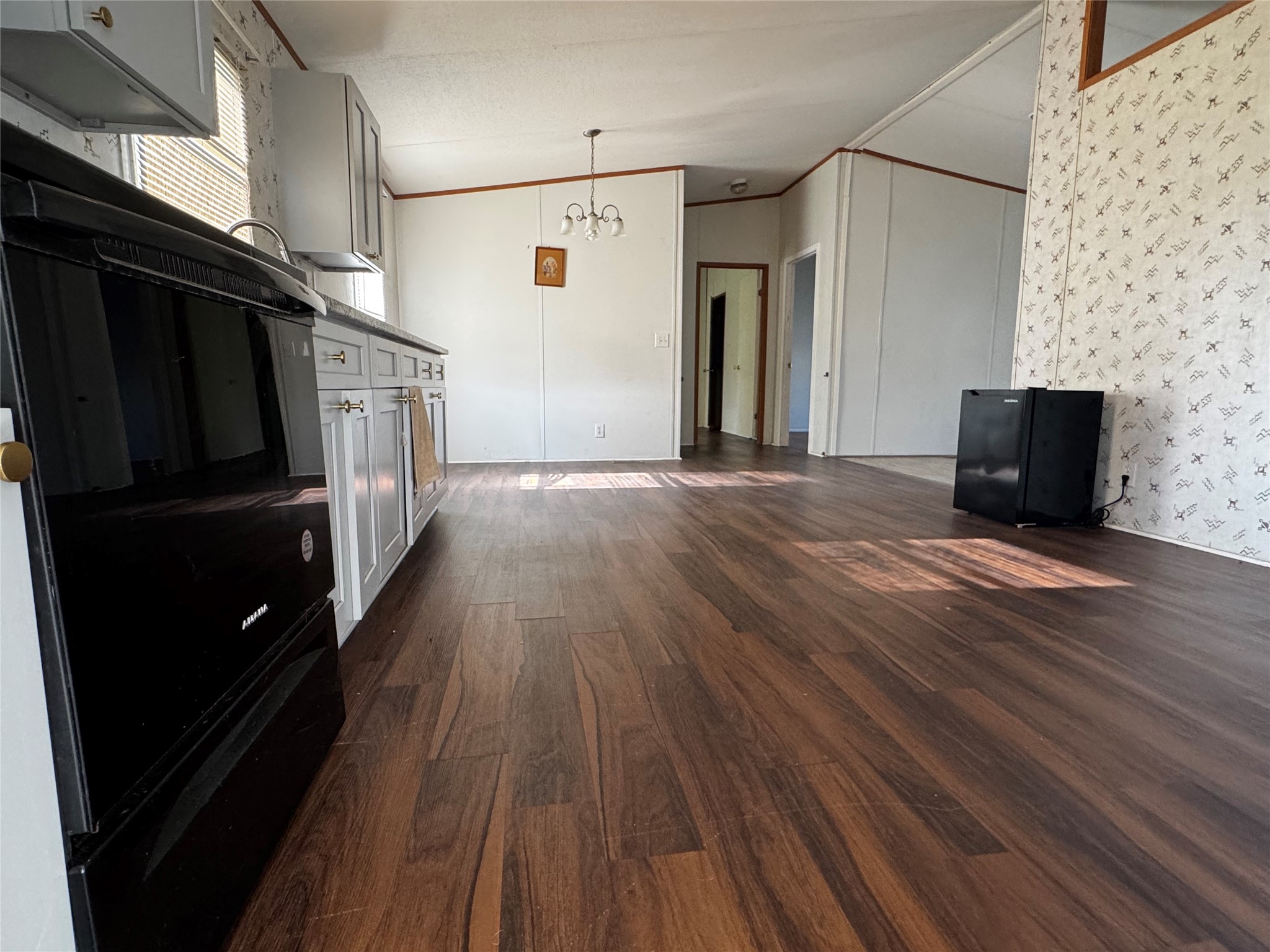 15930 Boss Gaston Road Sugar Land, TX 77498 - Photo 4 of 20 a view of empty room with wooden floor