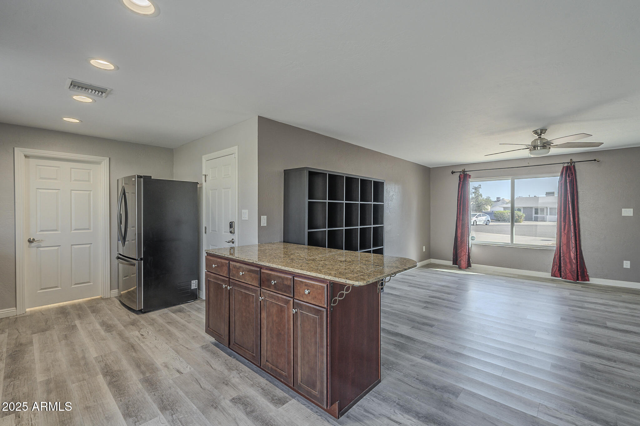 2914 East Cactus Road Phoenix, AZ 85032 - Photo 13 of 49 a large kitchen with stainless steel appliances granite countertop a refrigerator and a stove top oven