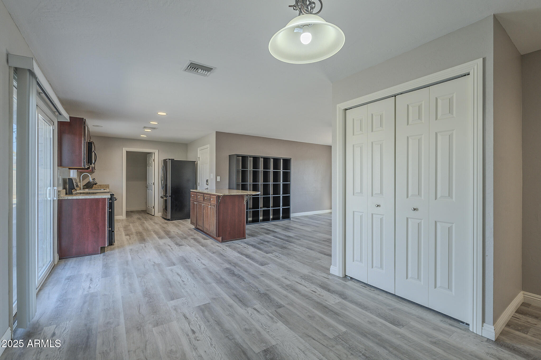 2914 East Cactus Road Phoenix, AZ 85032 - Photo 19 of 49 a view of kitchen with wooden floor