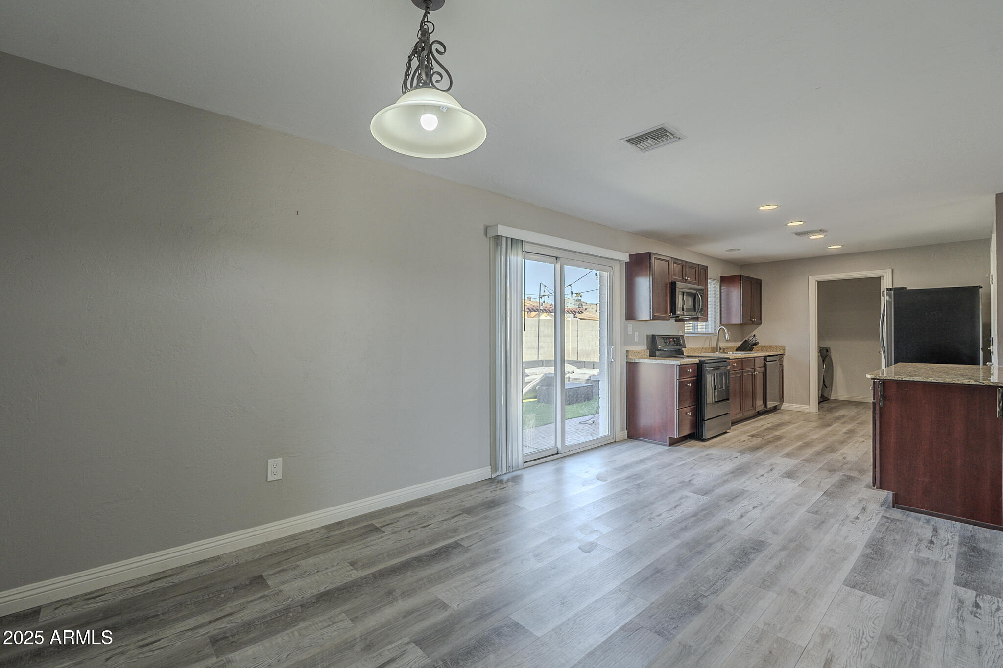 2914 East Cactus Road Phoenix, AZ 85032 - Photo 20 of 49 a view of kitchen and wooden floor
