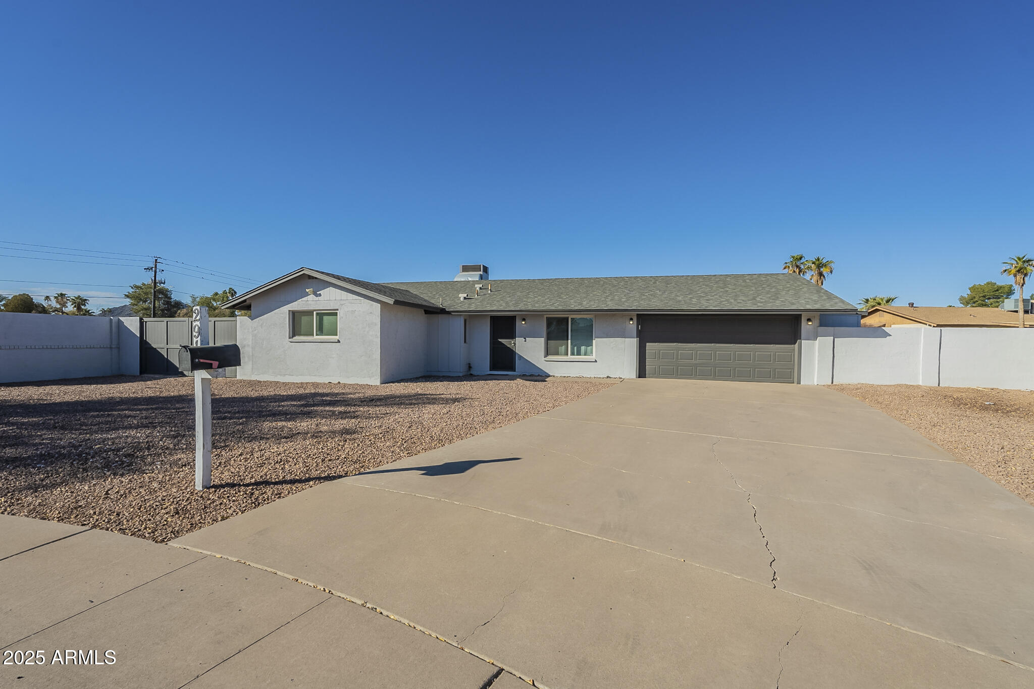 2914 East Cactus Road Phoenix, AZ 85032 - Photo 2 of 49 a view of house with backyard and parking