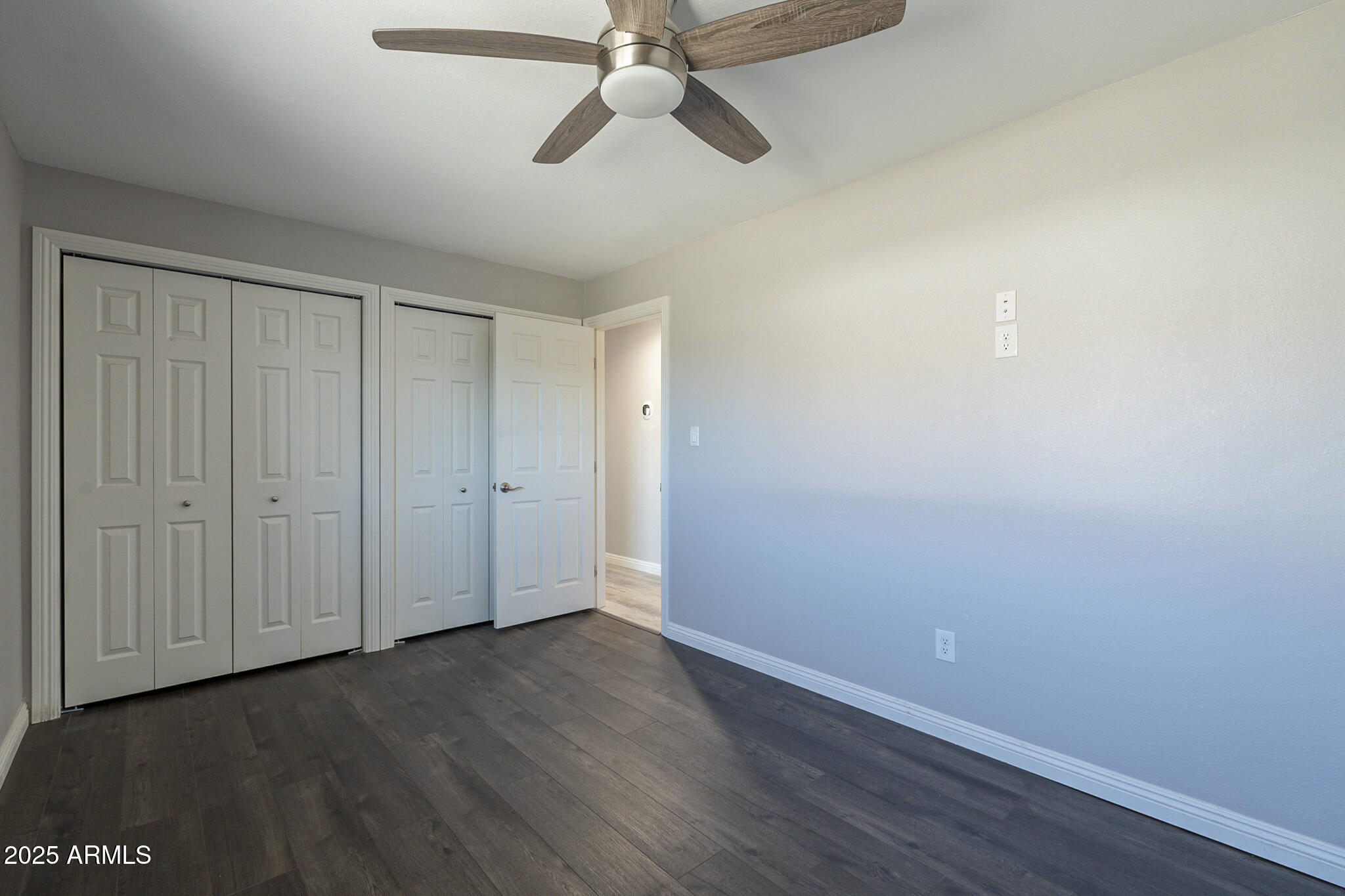 2914 East Cactus Road Phoenix, AZ 85032 - Photo 22 of 49 wooden floor in an empty room