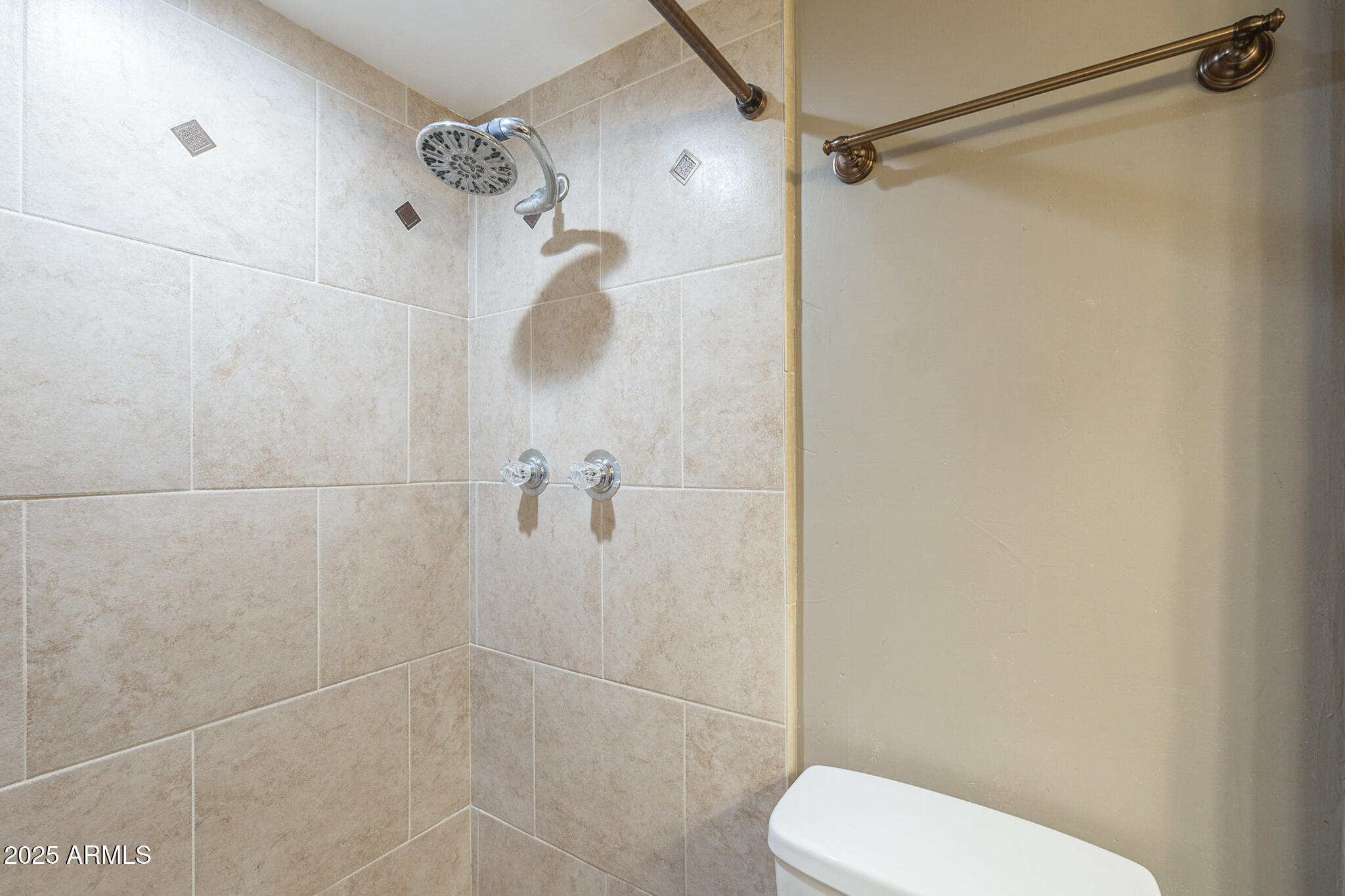 2914 East Cactus Road Phoenix, AZ 85032 - Photo 29 of 49 a bathroom with a shower and toilet