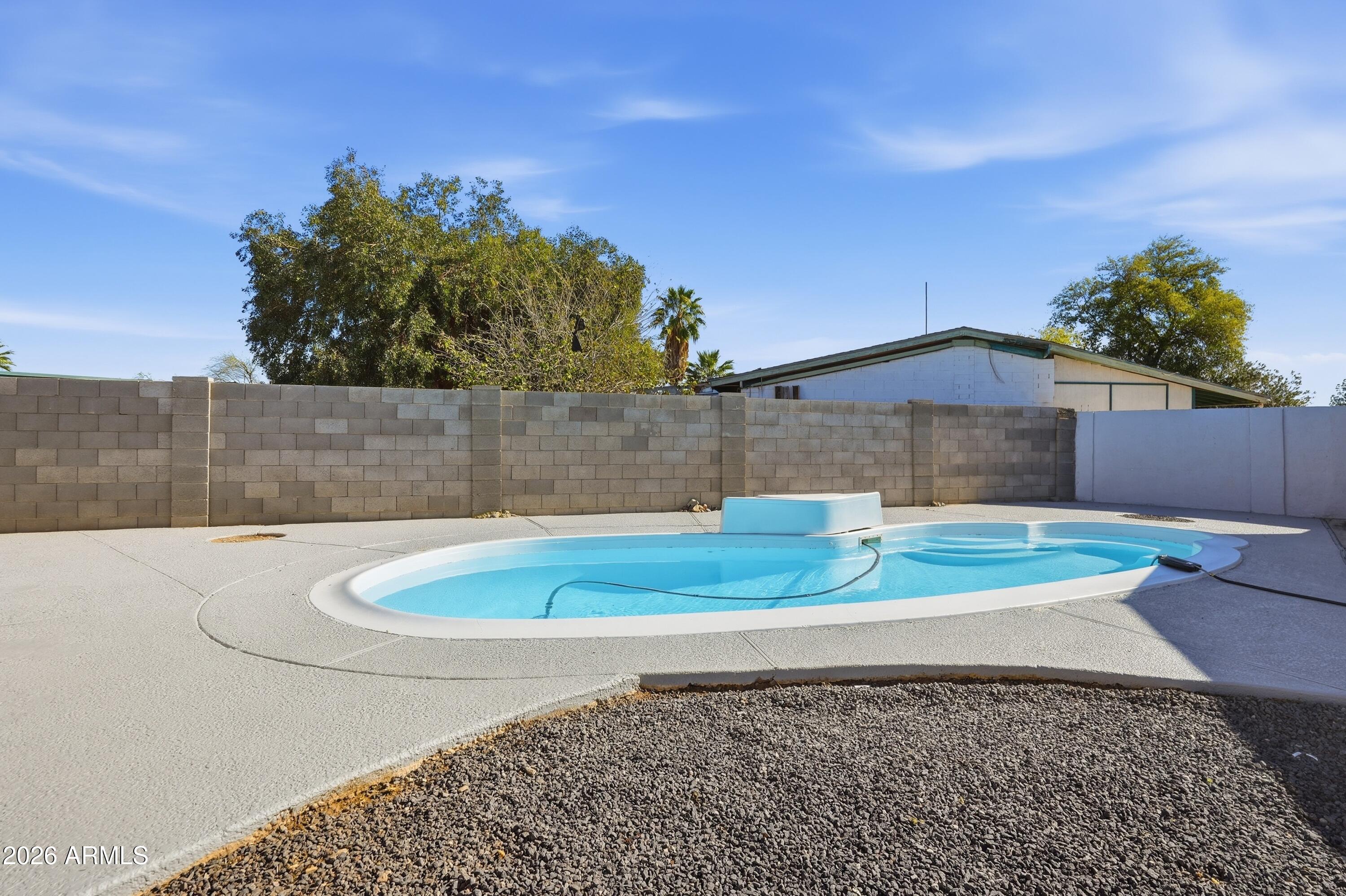 2914 East Cactus Road Phoenix, AZ 85032 - Photo 38 of 40 a view of a backyard
