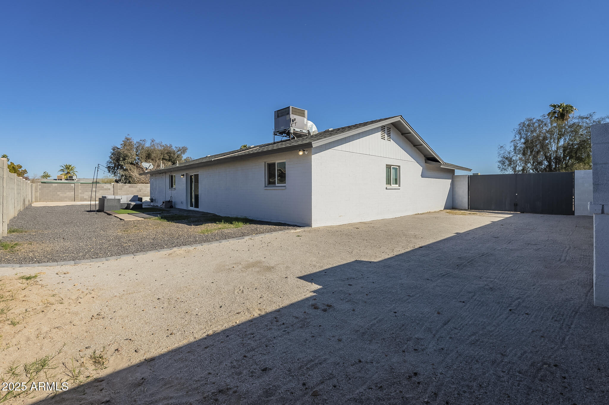 2914 East Cactus Road Phoenix, AZ 85032 - Photo 41 of 49 a view of a house with a backyard