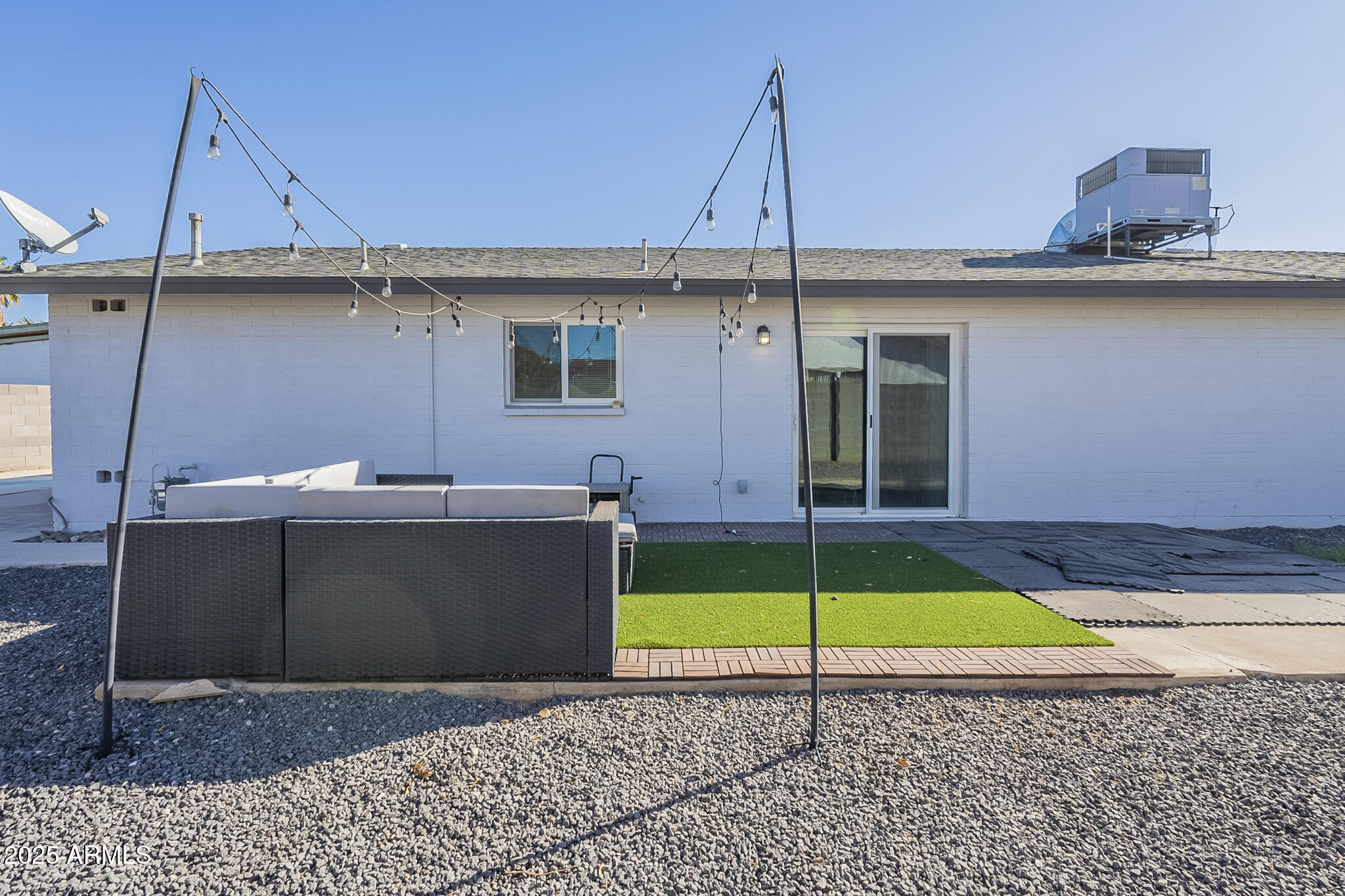 2914 East Cactus Road Phoenix, AZ 85032 - Photo 43 of 49 a view of a terrace with a table and chairs