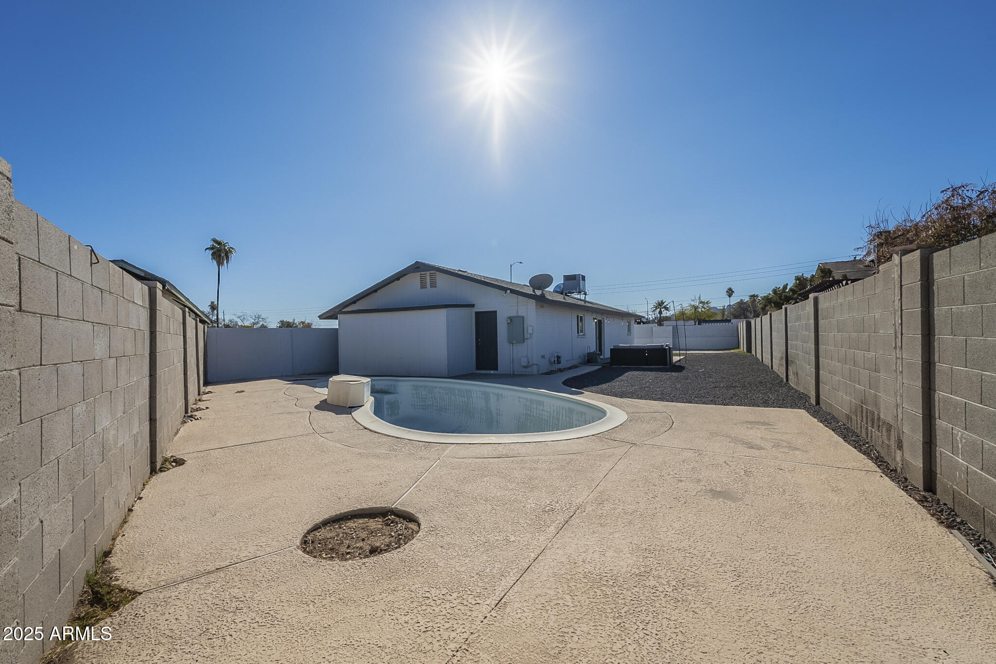 2914 East Cactus Road Phoenix, AZ 85032 - Photo 46 of 49 a view of a house with a backyard