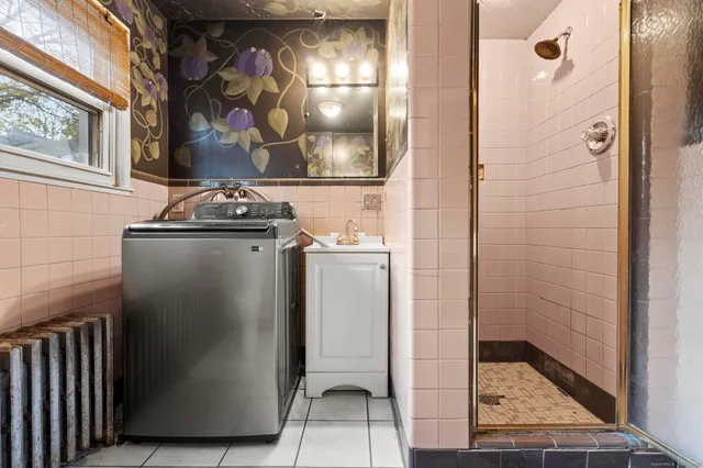 a bathroom with a toilet a sink and a bathtub