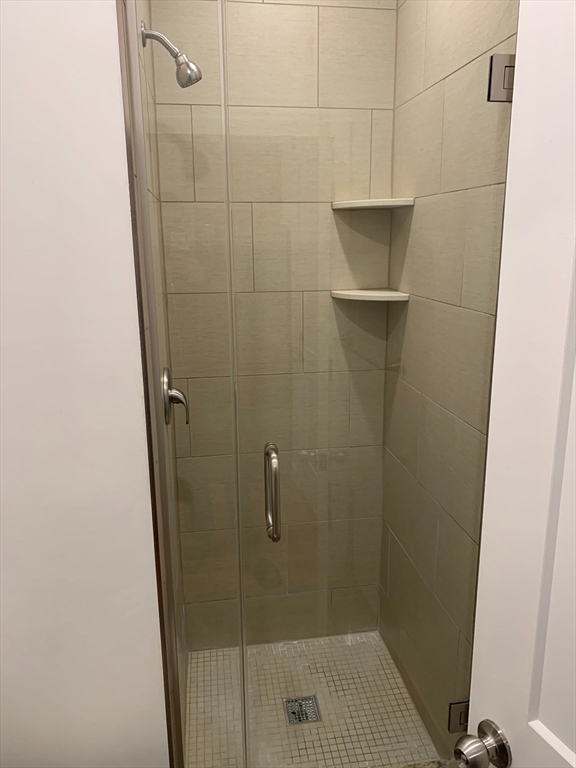 21 5th Street, Unit 20 Chelsea, MA 02150 - Photo 5 of 12 a bathroom with a shower
