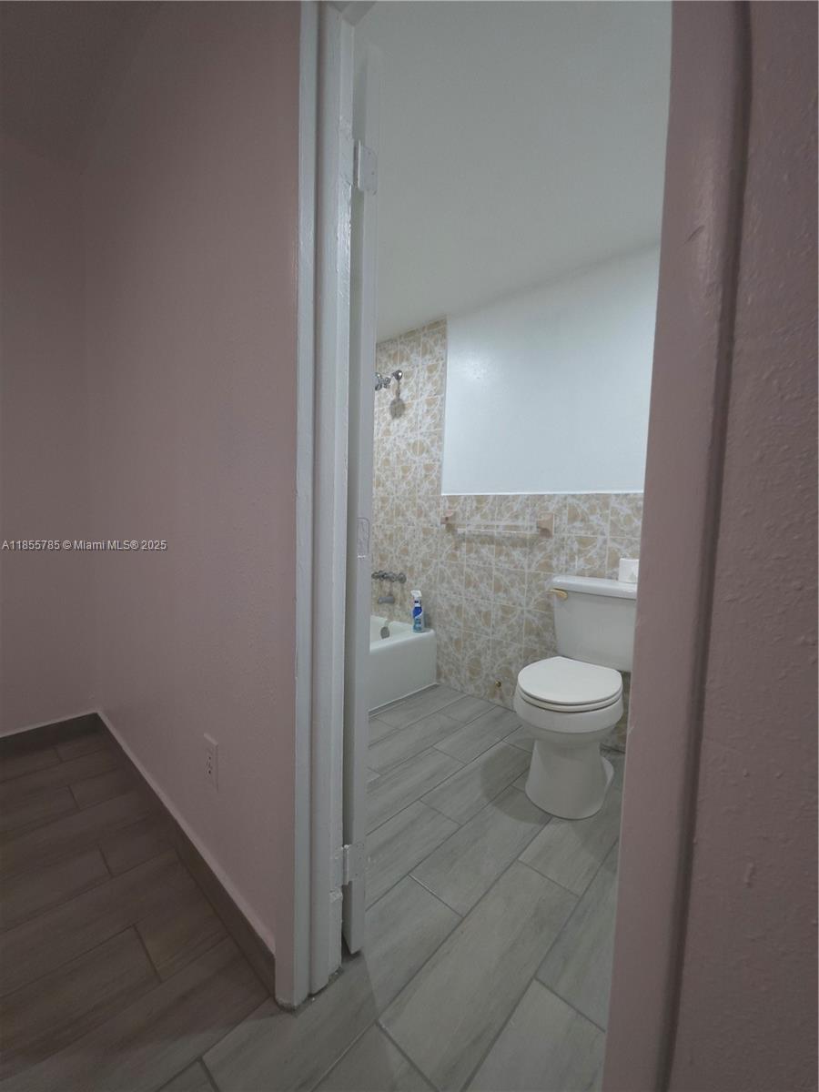 359 West 12th Street, Unit 2 Hialeah, FL 33010 - Photo 16 of 20 a bathroom with a toilet