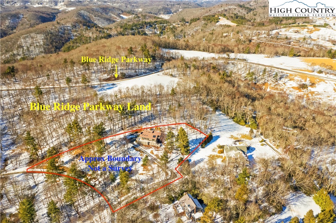 454 Huckleberry Trail Boone, NC 28607 - Photo 2 of 36 a view of residential houses with swimming pool