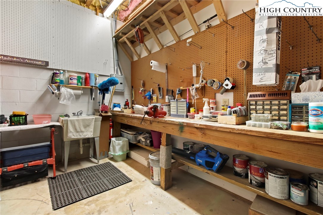 454 Huckleberry Trail Boone, NC 28607 - Photo 33 of 36 a outdoor kitchen with stainless steel appliances stove and sink