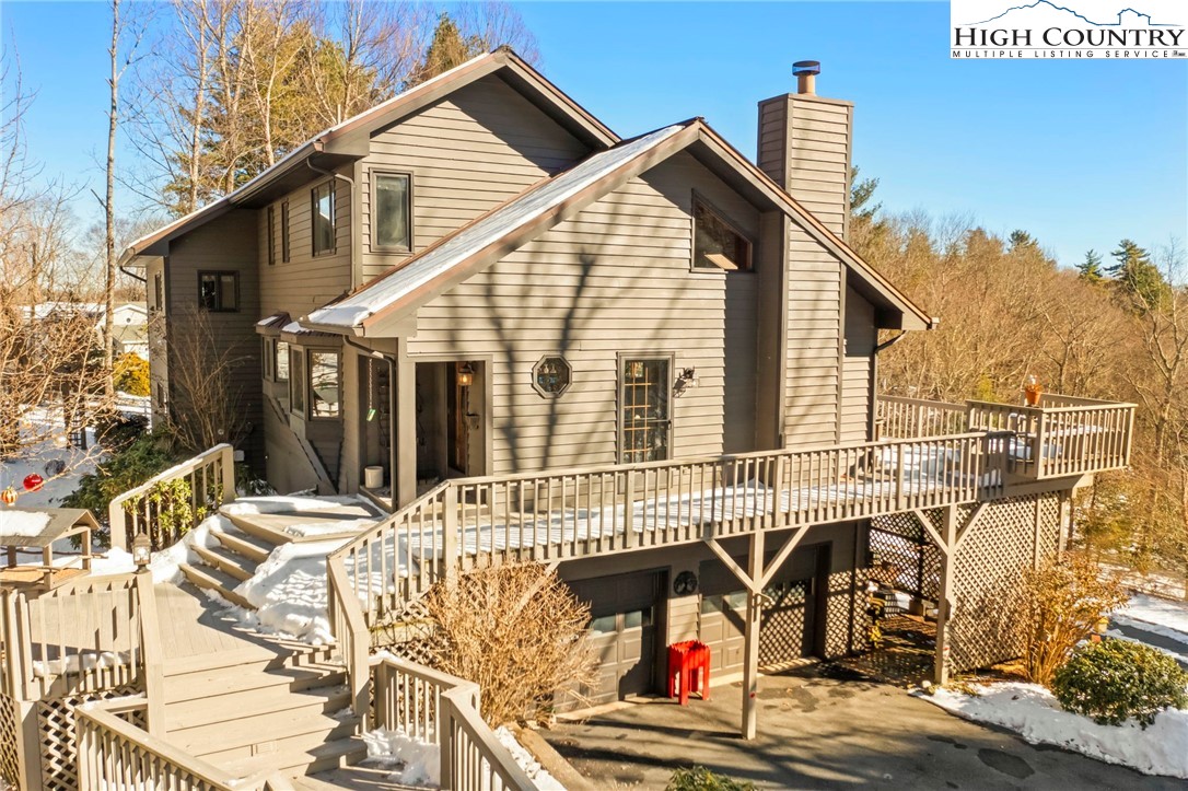 454 Huckleberry Trail Boone, NC 28607 - Photo 35 of 36 a view of a house with sitting area