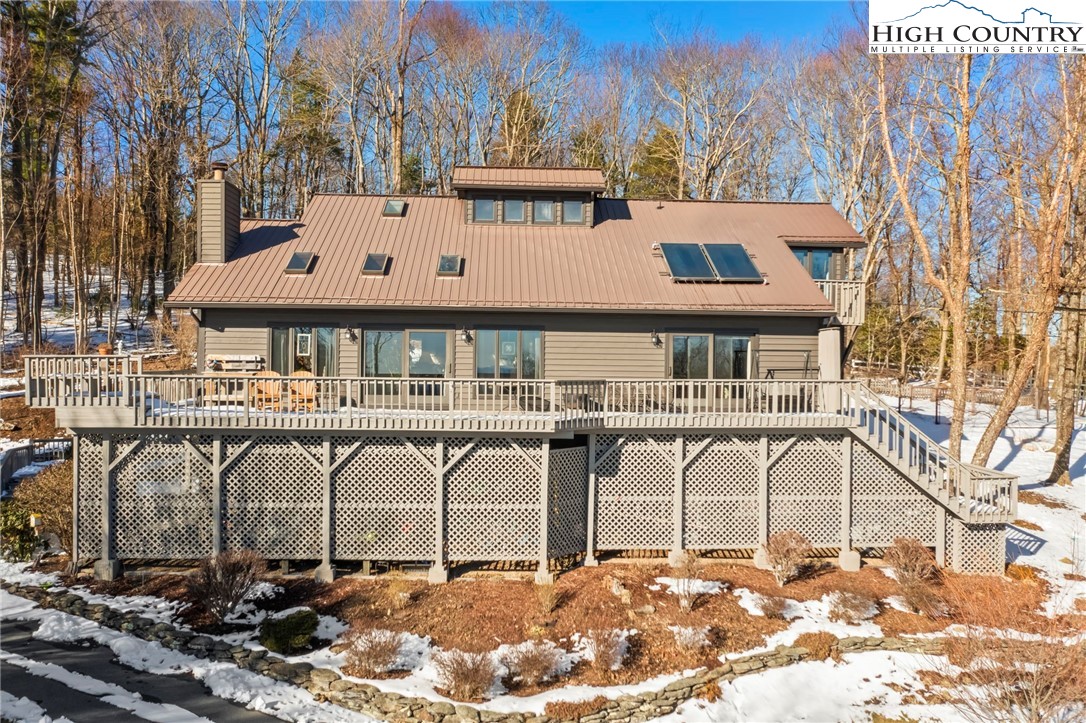 454 Huckleberry Trail Boone, NC 28607 - Photo 36 of 36 a front view of a house with large windows