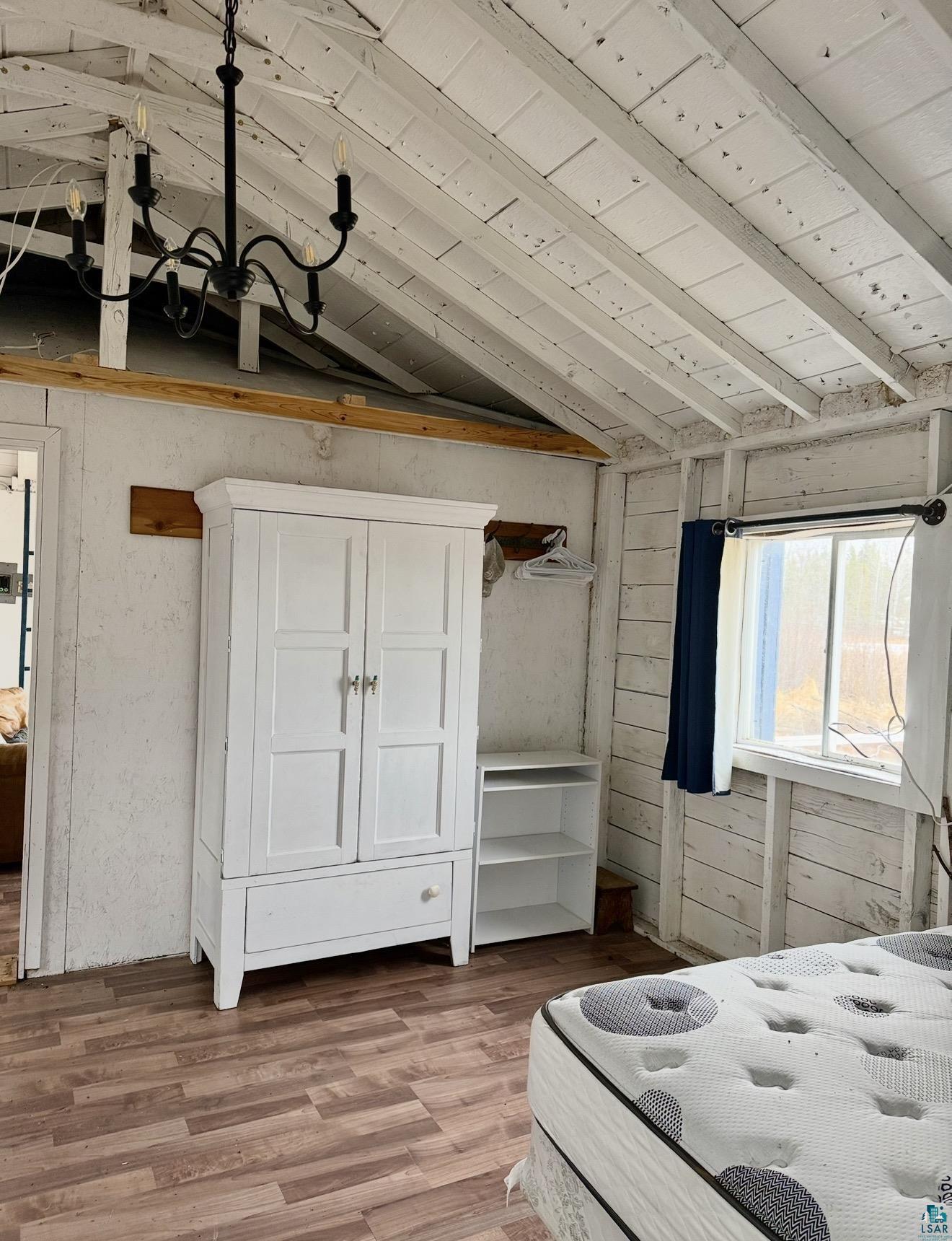 9572 Bonner Road Mountain Iron, MN 55768 - Photo 11 of 20 Bedroom with wood finished floors and a vaulted wood ceiling