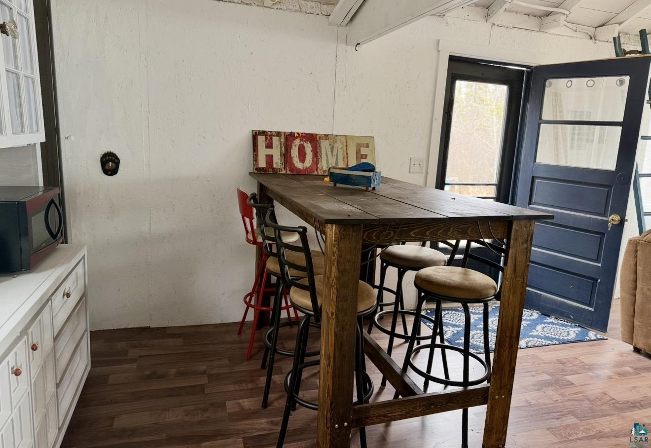 9572 Bonner Road Mountain Iron, MN 55768 - Photo 6 of 20 Dining room featuring dark wood finished floors