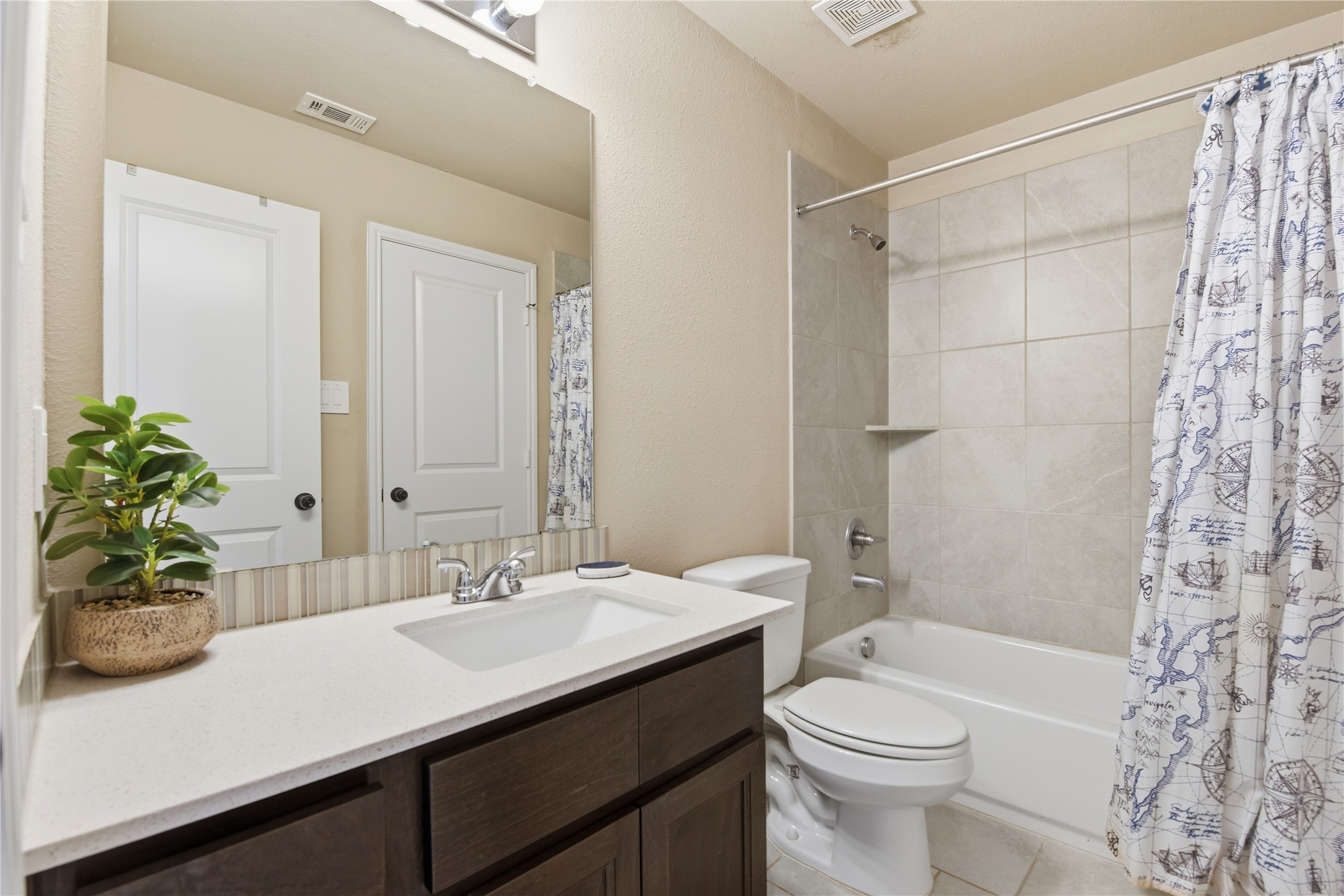 17501 Spice Merlot Lane Conroe, TX 77302 - Photo 42 of 50 a bathroom with a sink a toilet and shower