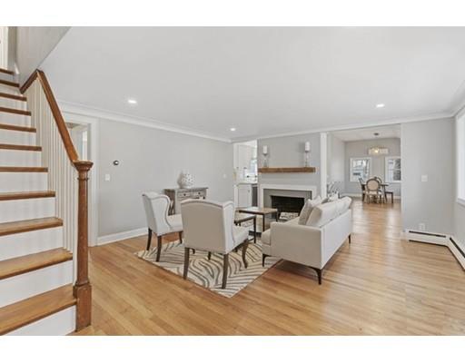 2 Abbott Road Natick, MA 01760 - Photo 2 of 23 a living room with furniture and a fireplace