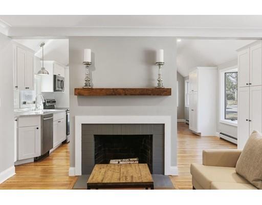 2 Abbott Road Natick, MA 01760 - Photo 4 of 23 a living room with furniture and a fireplace