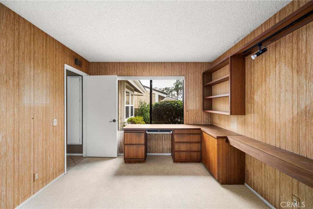 10 Greenbriar, Unit 31 Irvine, CA 92604 - Photo 23 of 46 a large white kitchen with a large window