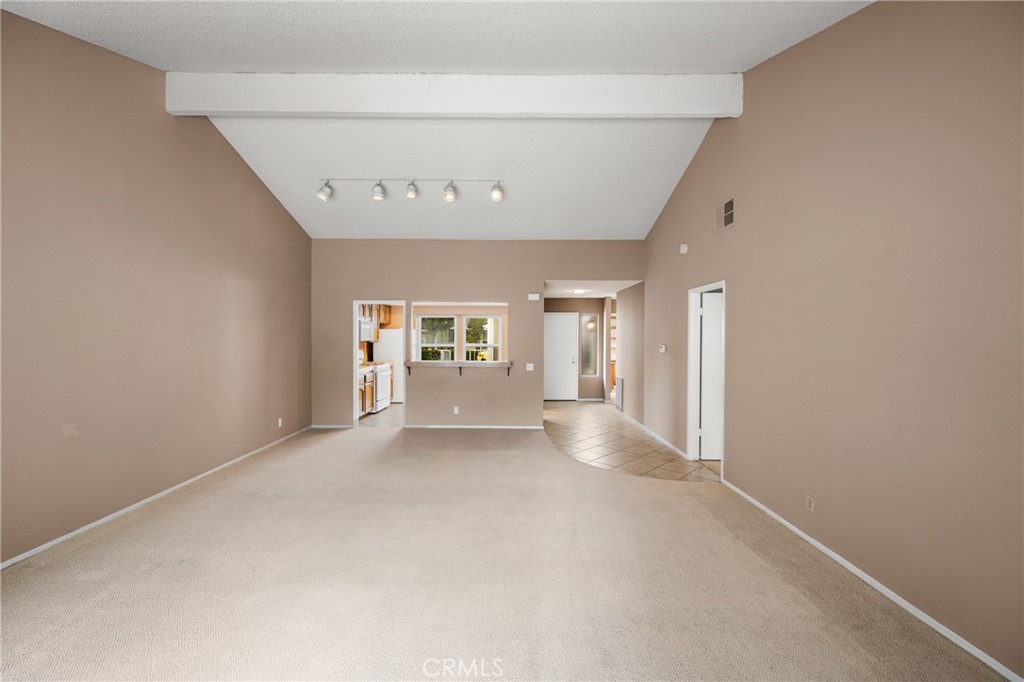 10 Greenbriar, Unit 31 Irvine, CA 92604 - Photo 27 of 46 an empty room with windows and pillars in it