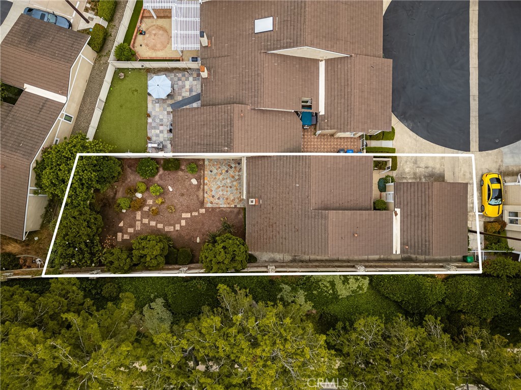 10 Greenbriar, Unit 31 Irvine, CA 92604 - Photo 36 of 46 an aerial view of a house with a yard