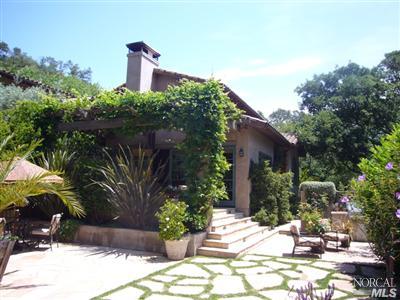 4 Rock Road Kentfield, CA 94904 - Photo 1 of 12 a backyard of a house with lots of green space