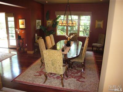 4 Rock Road Kentfield, CA 94904 - Photo 4 of 12 a view of a dining room with furniture window and wooden floor