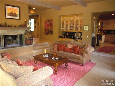 4 Rock Road Kentfield, CA 94904 - Photo 5 of 12 a living room with furniture and a fireplace