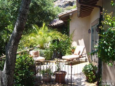 4 Rock Road Kentfield, CA 94904 - Photo 9 of 12 a backyard of a house with lots of green space