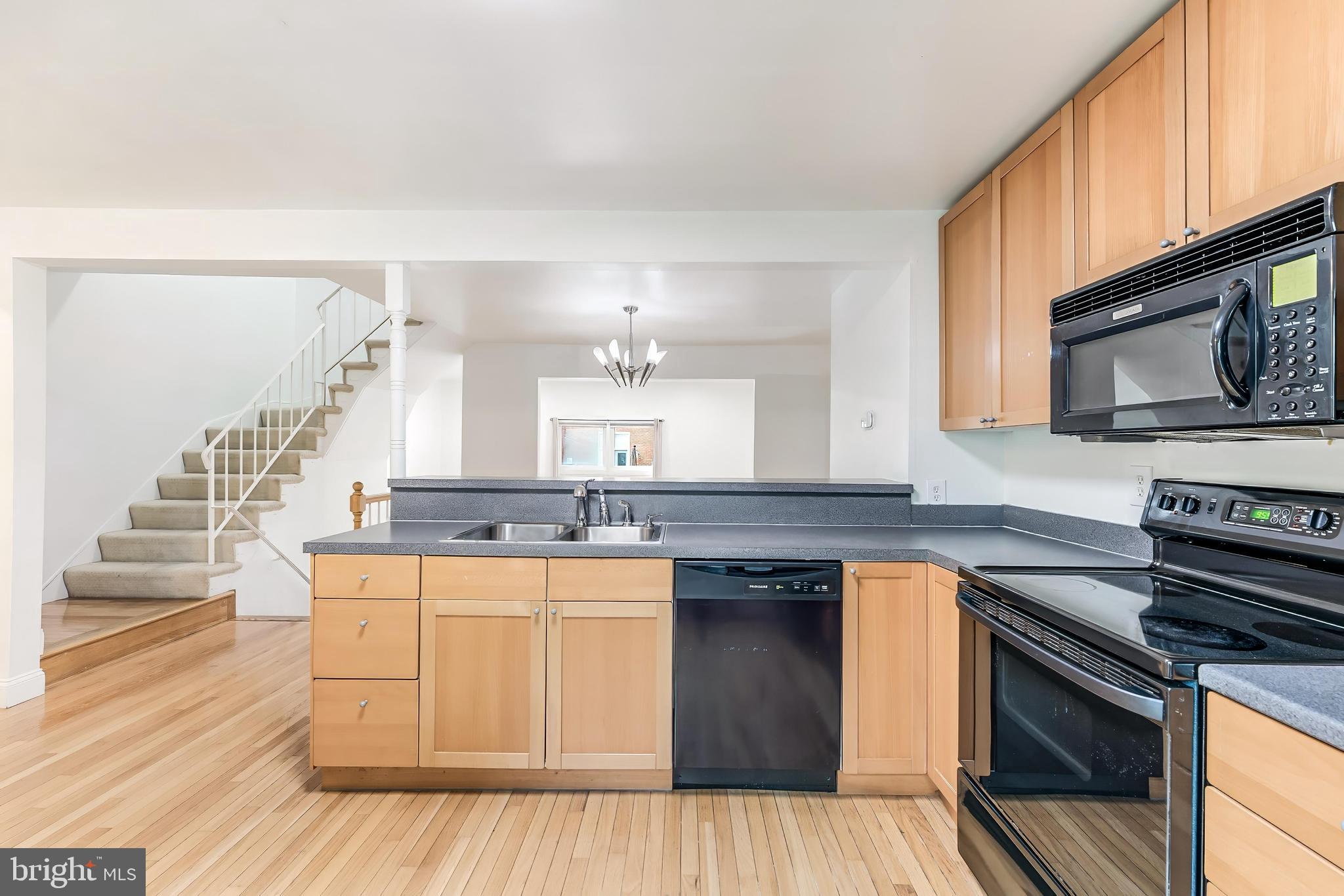 2331 Harleyford Court Reston, VA 20191 - Photo 5 of 40 Modern kitchen with sleek finishes.