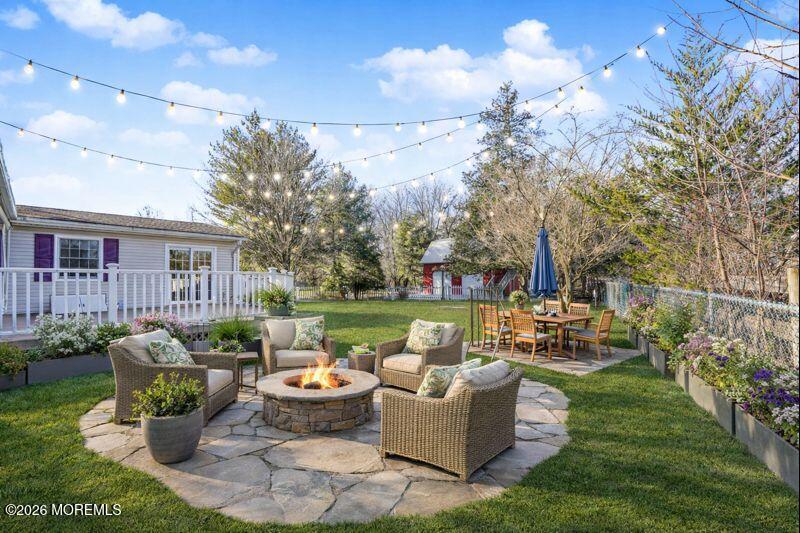 66 Cedar Swamp Road Jackson, NJ 08527 - Photo 13 of 56 a view of a house with patio in the backyard