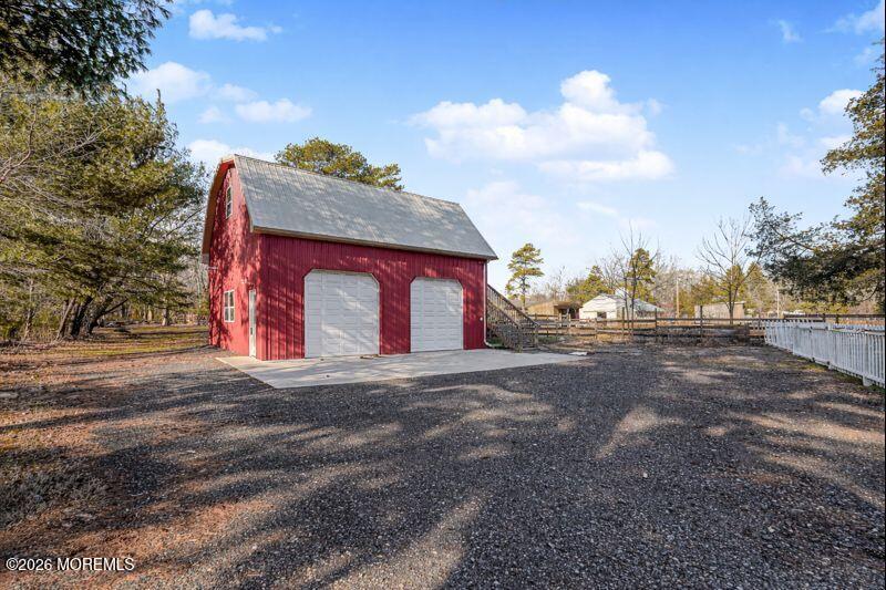 66 Cedar Swamp Road Jackson, NJ 08527 - Photo 17 of 56 a view of a house with a yard