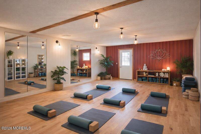 66 Cedar Swamp Road Jackson, NJ 08527 - Photo 19 of 56 a living room with furniture and a large window