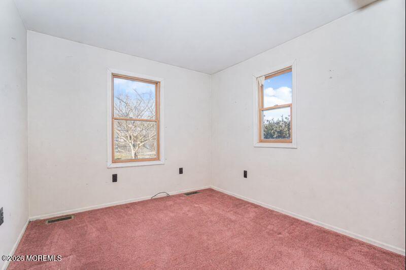 66 Cedar Swamp Road Jackson, NJ 08527 - Photo 28 of 56 an empty room with windows