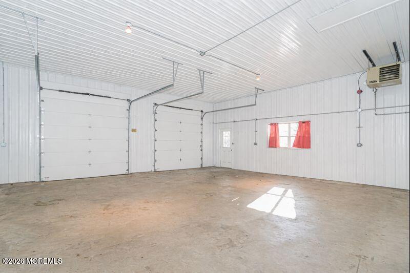 66 Cedar Swamp Road Jackson, NJ 08527 - Photo 34 of 56 a view of a garage