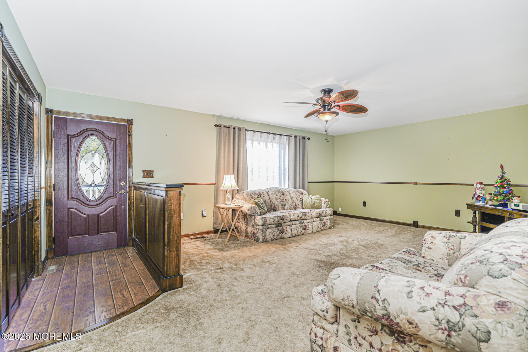66 Cedar Swamp Road Jackson, NJ 08527 - Photo 42 of 56 a bedroom with bed and a chandelier