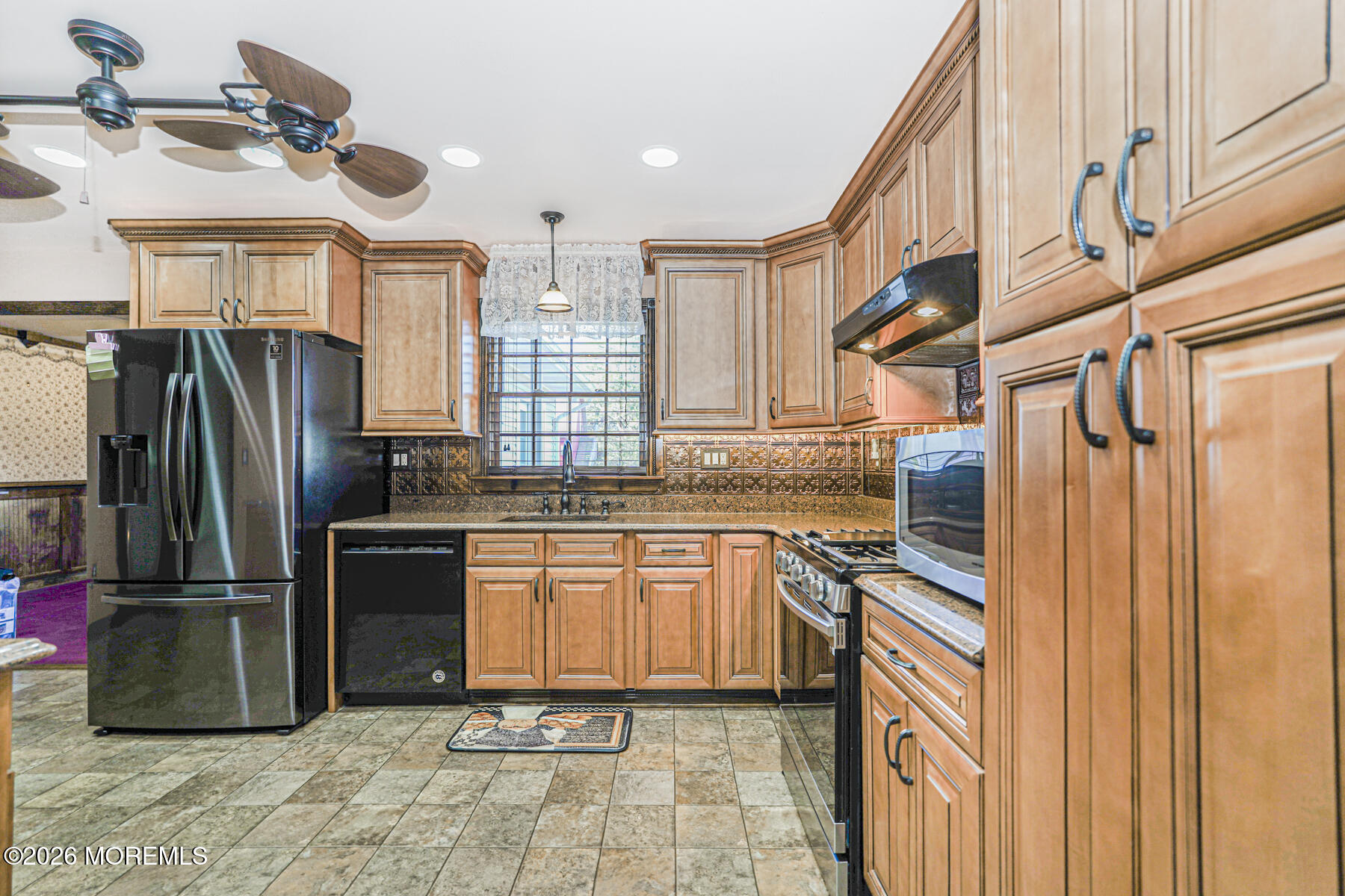 66 Cedar Swamp Road Jackson, NJ 08527 - Photo 45 of 56 a kitchen with stainless steel appliances granite countertop a refrigerator and a sink