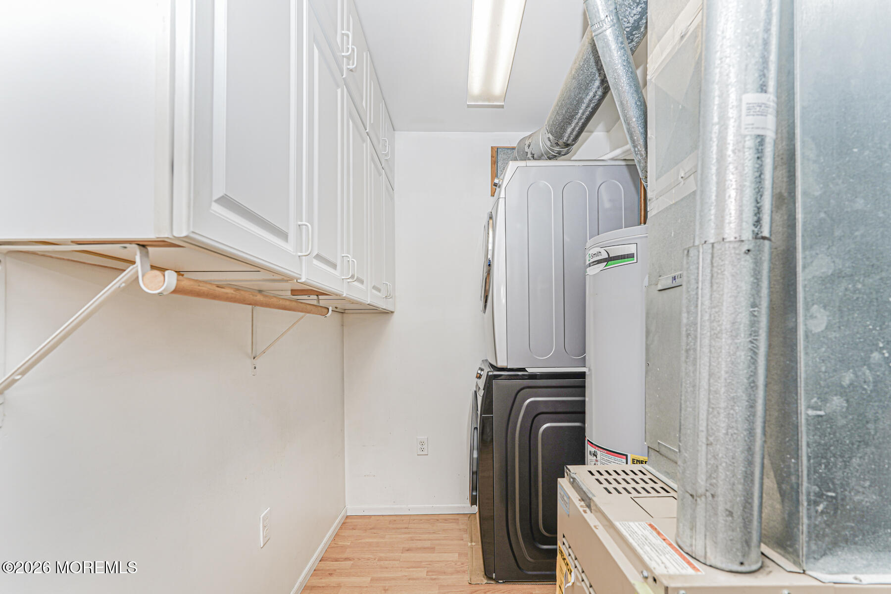 66 Cedar Swamp Road Jackson, NJ 08527 - Photo 55 of 56 a view of walk in closet with clothes and shoes