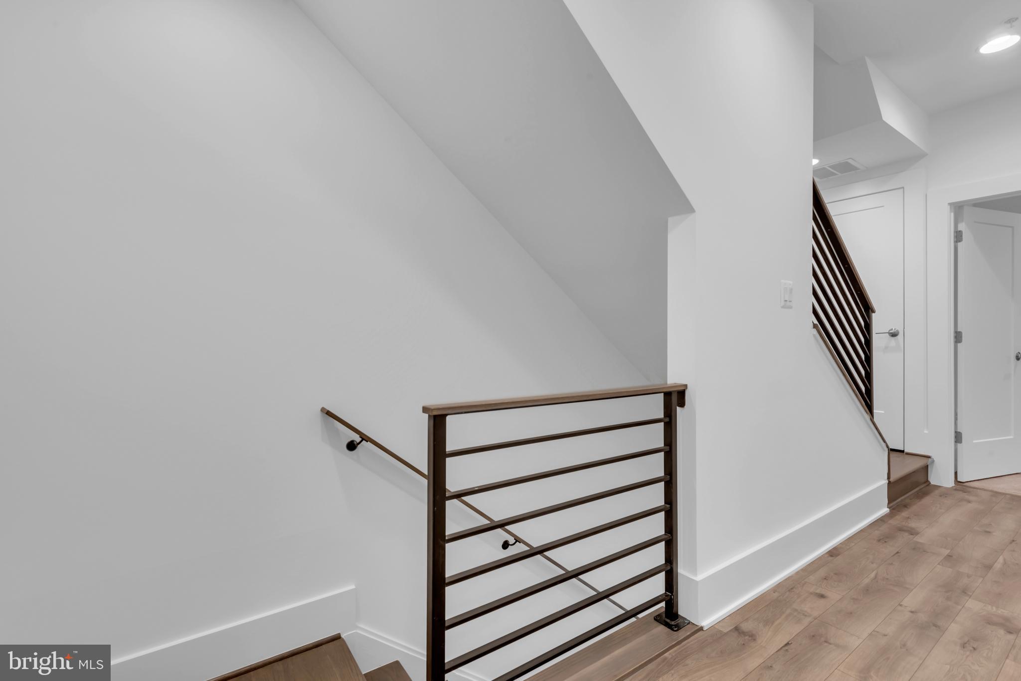 11366 Emerald Park Road Potomac, MD 20854 - Photo 33 of 59 a view of a hallway with stairs