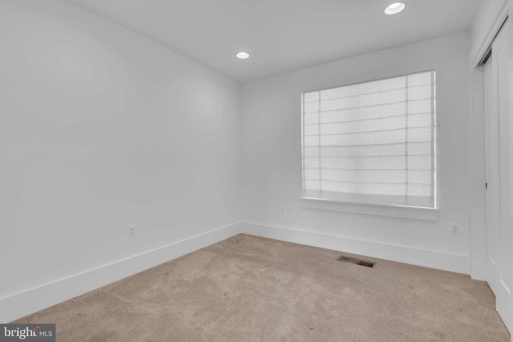 11366 Emerald Park Road Potomac, MD 20854 - Photo 42 of 59 a view of an empty room with a window