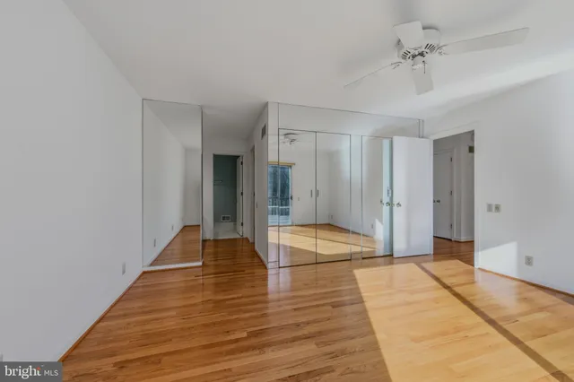 a view of livingroom with hardwood floor and ceiling fan